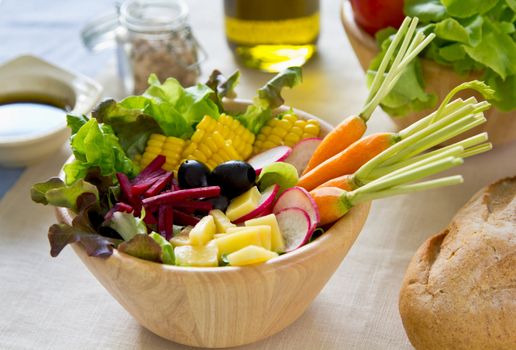 Sweetcorn with lettuce,beetroot,radish, cheese ,baby carrot and olive salad