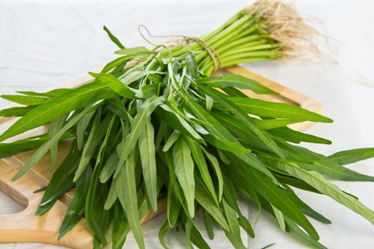 Morning glory vegetable in bamboo basket