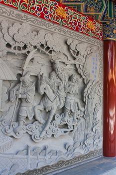 Closeup photo of Chinese relief in the Temple
