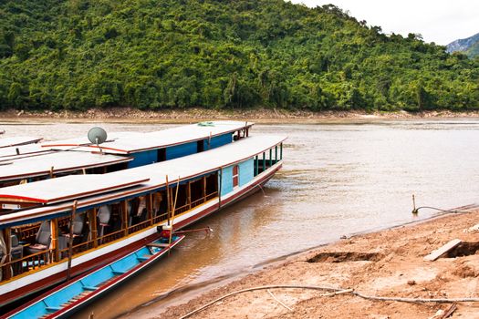 Boat sailing in the river to bring people in Laos country