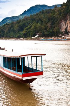 Boat sailing in the river to bring people in Laos country