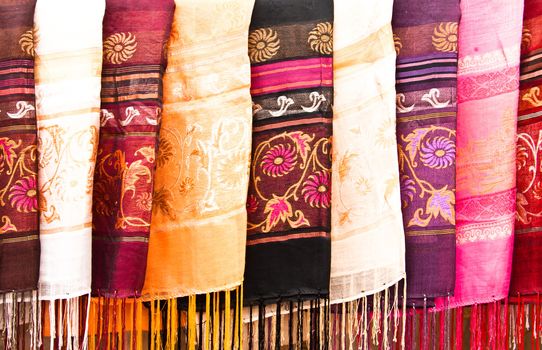 Multi-colored scarf. Was put into the background.