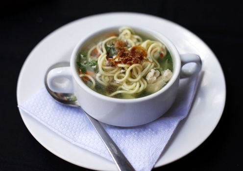 Popular comfort food of chicken noodle soup a favorite in Indonesia