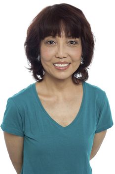 Picture of a smiling asian lady posing casually. Closeup shot