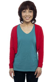 Casually portrait of smiling asian beauty against white background