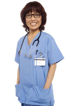 Relaxed female surgeon posing casually. Isolated on white