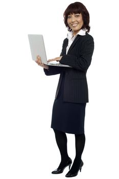 Lets get back to work. Woman with laptop. Full length shot