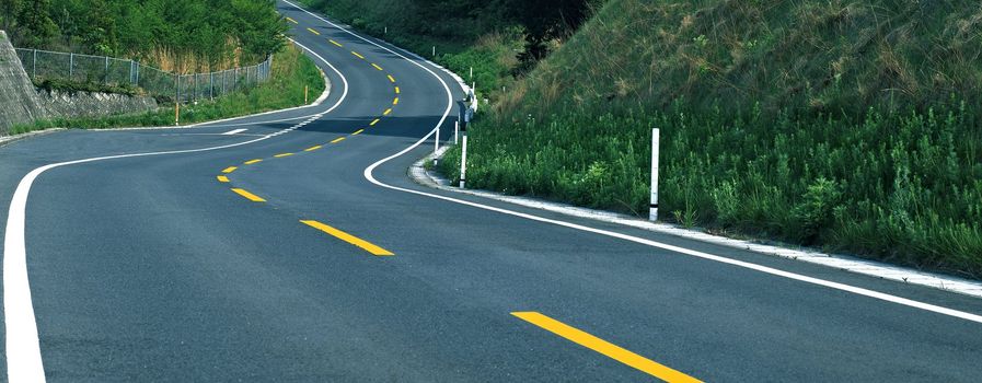 Empty curved road