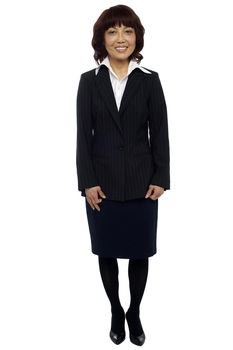 Experienced Asian business lady. Team leader. Full length portrait
