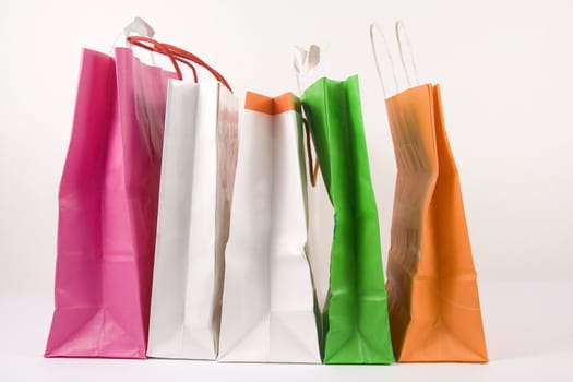 Assorted colored shopping bags