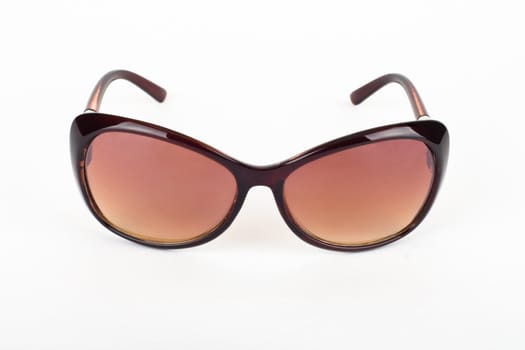 Brown sunglasses isolated on the white background