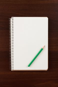 Note book and pencil, isolated on white