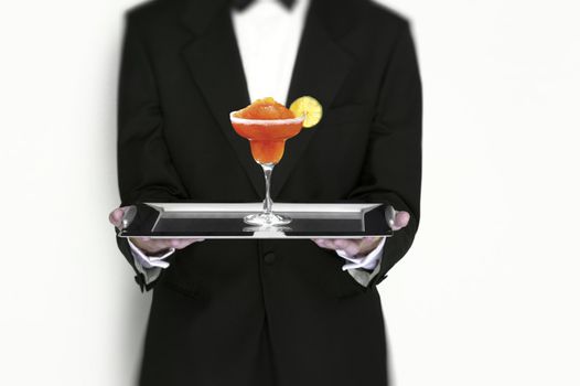 Manhattan Cocktail Being Served by Waiter on Silver Tray isolated