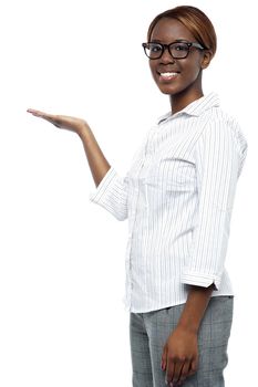 Businesswoman presenting copy space isolated over white background