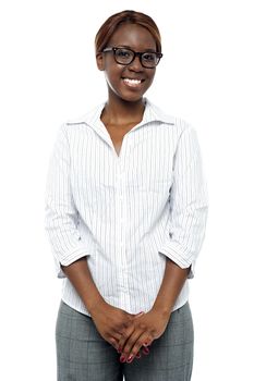 Portrait of casual smiling african businesswoman isolated against white background