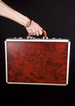 Hand man with a red briefcase