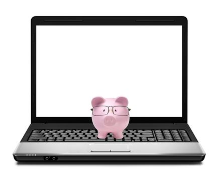 Piggy bank on laptop isolated on white background