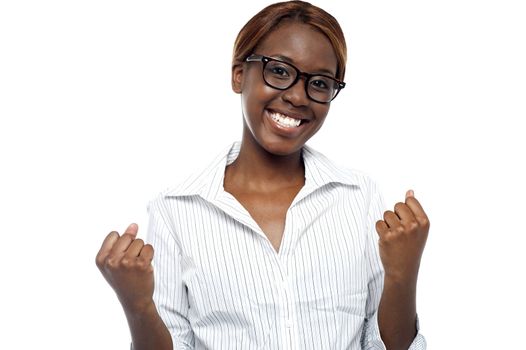 Businesswoman expressing her success. Yes, we did it! Business success concept