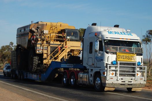 Oversize truck on highway in Australian outback