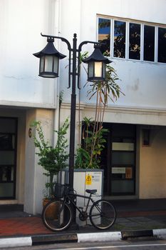 Bicycle and street lights in the street, Singapore