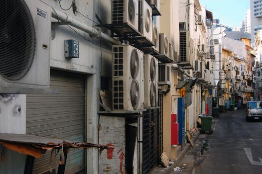 Air conditioning on the wall at side street, Singapore