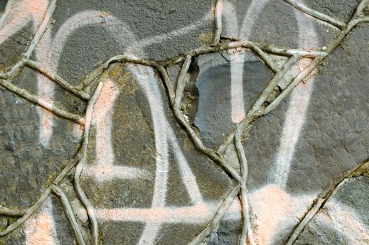 Closeup of graffiti painted masonry concrete retro wall background.