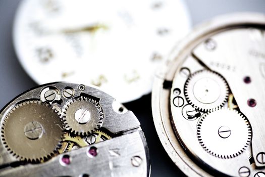 Old metal mechanical clock with gear wheels
