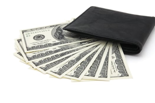 Black leather purse and dollars on a white background