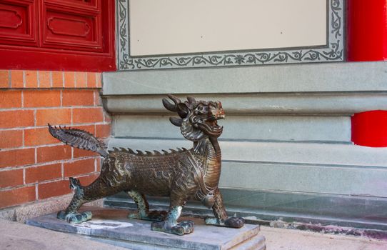 The ancient bronze guardians like lion and dragon