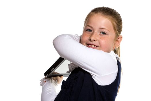 The little girl with the tablet on a white background