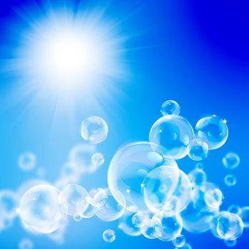 Abstract blue sunny background with flying soap bubbles