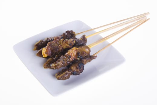 Satay. Asian cuisine - Satay on a background