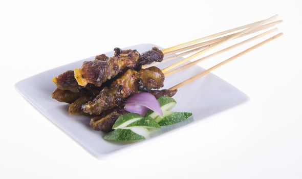 Satay. Asian cuisine - Satay on a background