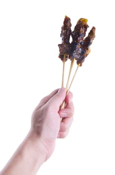 Satay. Hand Holding Sticks Of Barbecue Satay