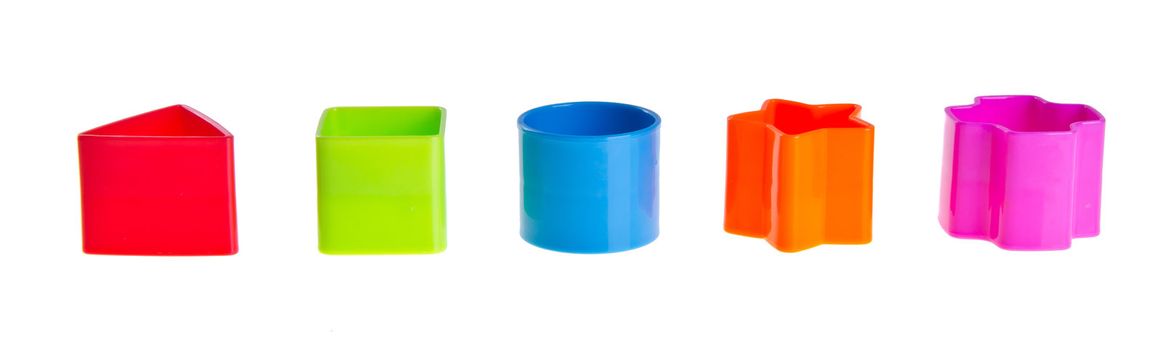 Shape Sorter. Stacks of Shape Sorter Toy Blocks on background