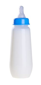 Baby bottle with milk on the background