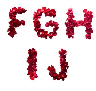 Alphabet letter F - J made from red petals rose isolated on a white background