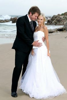 Gorgeous wedding couple on the beach on their special day
