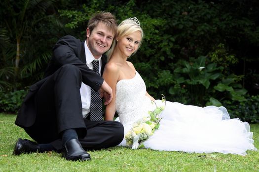 Lovely young smiling couple on their wedding day