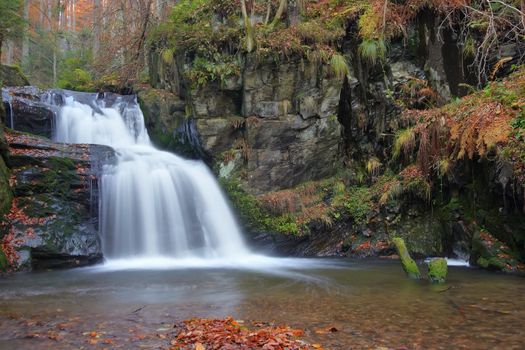 Shot of the fall of water. Stream Huntava - natural area - nature preserve.
Resov, Czech republic, Europe.