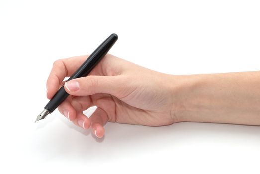 A pen in a hand isolated