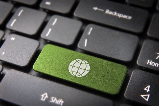Global go green key with Earth icon on laptop keyboard. Included clipping path, so you can easily edit it.
