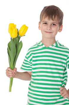 Young boy holding tulips isolated on white