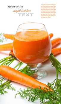carrots and carrot juice in a glass