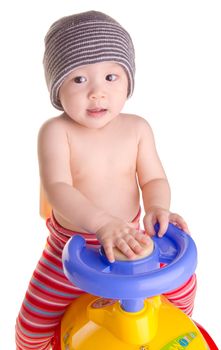 baby and toy - baby boy governs toy car