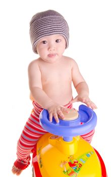 baby and toy - baby boy governs toy car