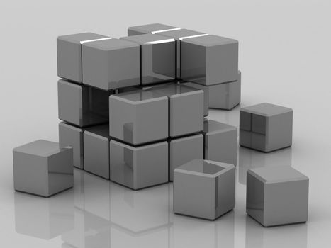 metal cube assembling from blocks on a gray background