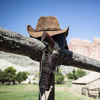 cowboy gun and hat outdoor under sunlight, USA