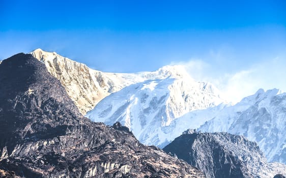 Kangchenjunga is the third highest mountain in the world. It rises with an elevation of 8,586 m : From Dzongri View Point