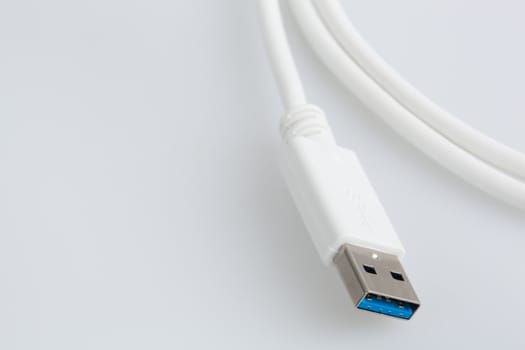 White USB Cable on a white backrgound